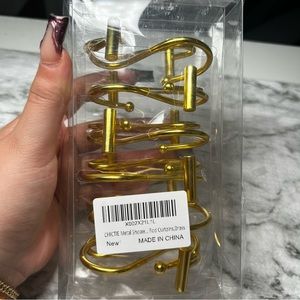Gold shower curtain hooks